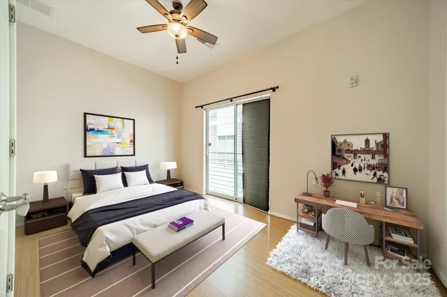 a bedroom with a bed and a couch