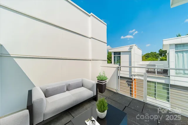 a balcony with furniture