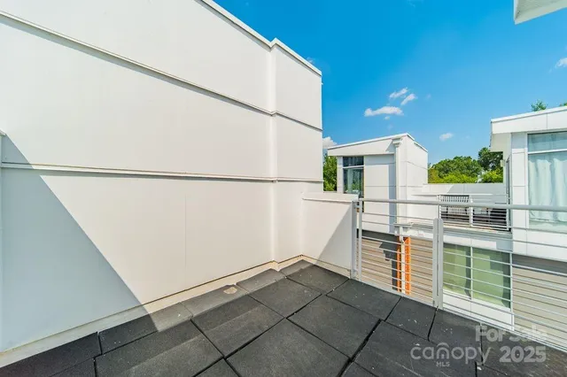 a kitchen with a refrigerator and an oven