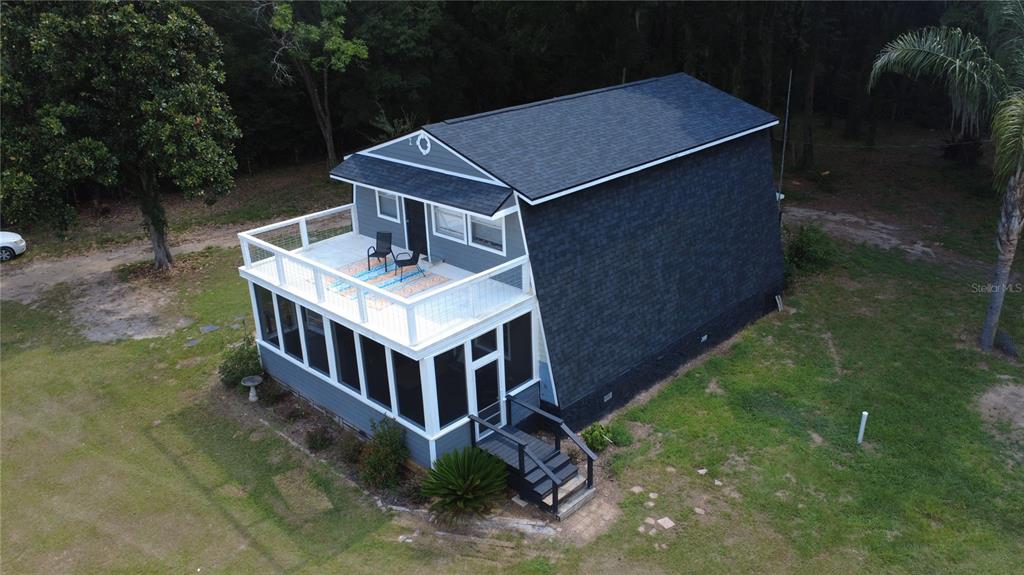 a roof deck with a yard