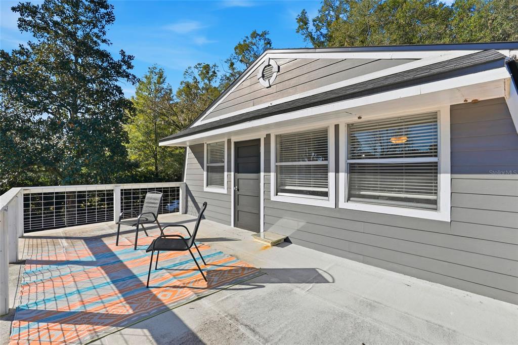 15024 Northwest 89th Street Alachua, FL 32615 - Photo 27 of 31 a view of a house with pool and wooden floor