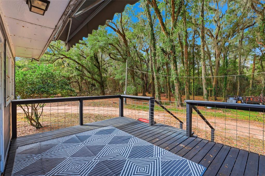 15024 Northwest 89th Street Alachua, FL 32615 - Photo 28 of 31 a view of outdoor space with swimming pool