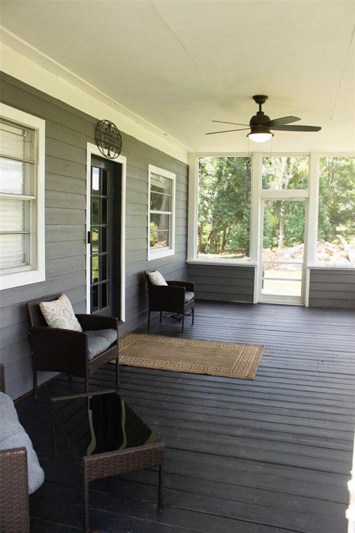 15024 Northwest 89th Street Alachua, FL 32615 - Photo 4 of 16 a living room with furniture and a large window