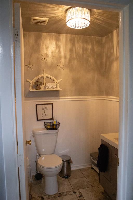 15024 Northwest 89th Street Alachua, FL 32615 - Photo 7 of 16 a bathroom with a toilet and a sink