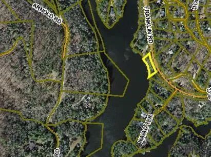 a view of pool with outdoor seating