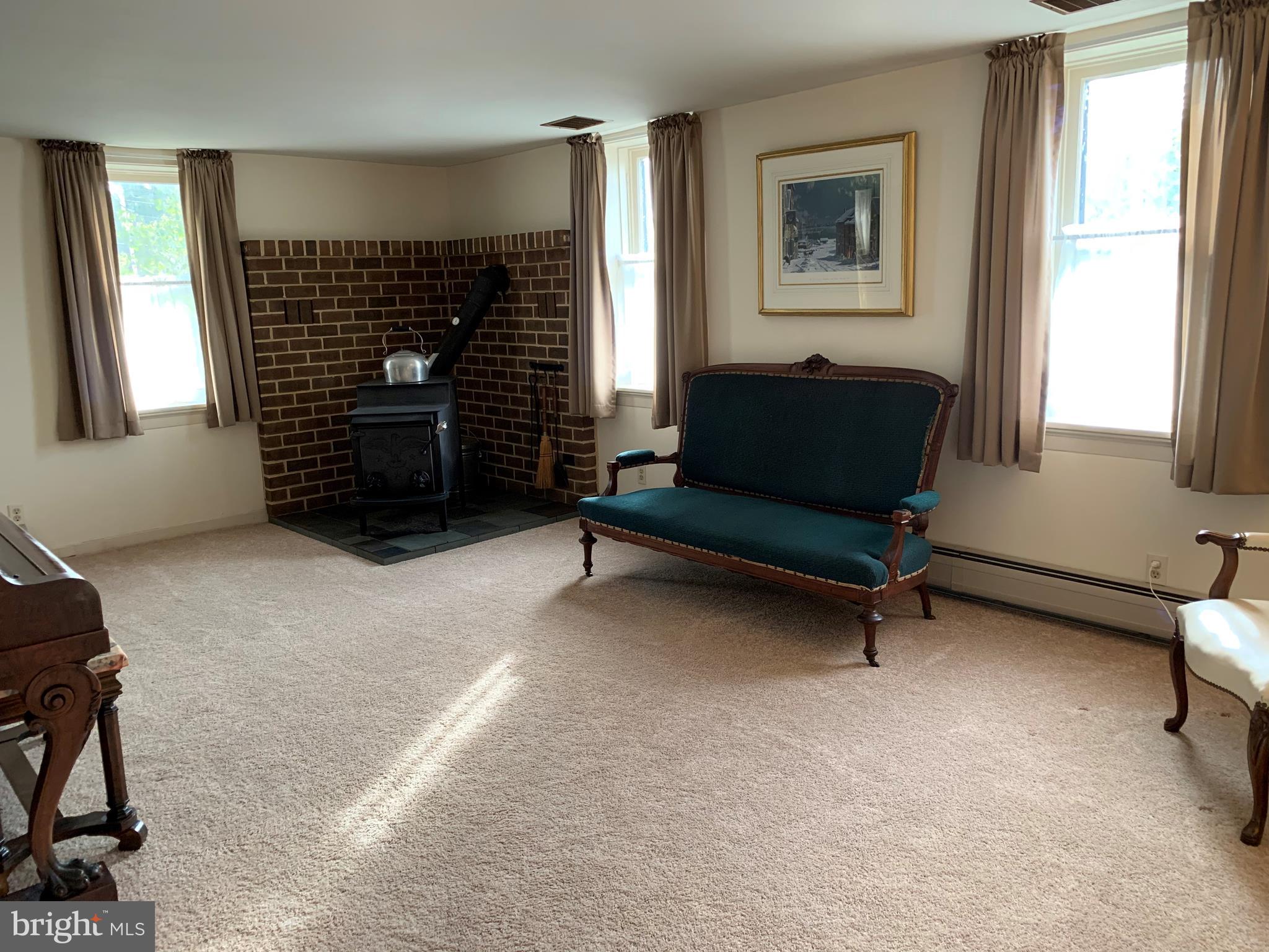 1965 Spring Road Carlisle, PA 17013 - Photo 14 of 31 Living room has hardwoods underneath carpet.