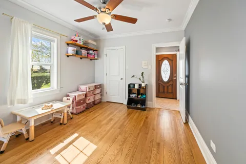 a bedroom with furniture and a window