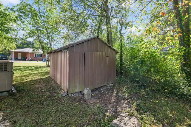a backyard of a house with lots of green space