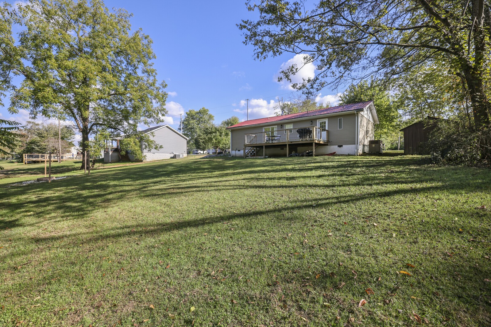408 Magnolia Street Baxter, TN 38544 - Photo 32 of 44 a tall tree in middle of green field