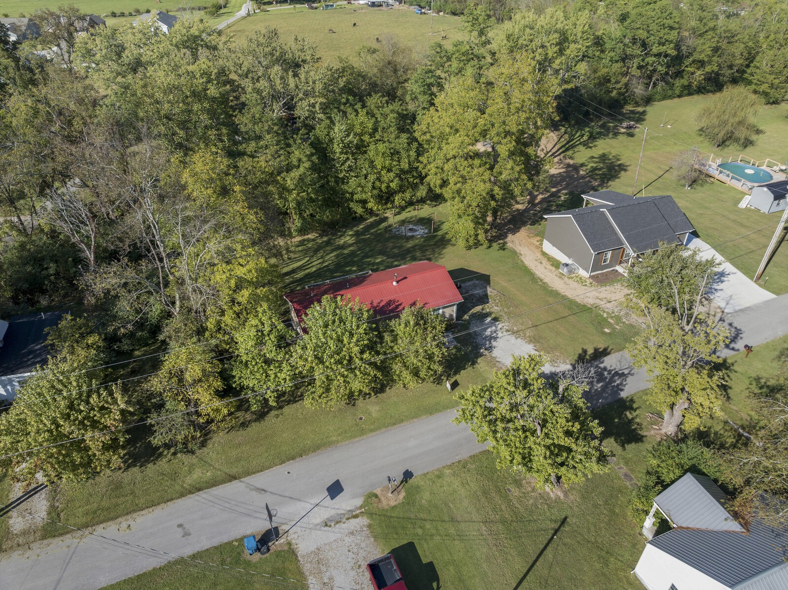 408 Magnolia Street Baxter, TN 38544 - Photo 38 of 44 an aerial view of residential house with yard and swimming pool
