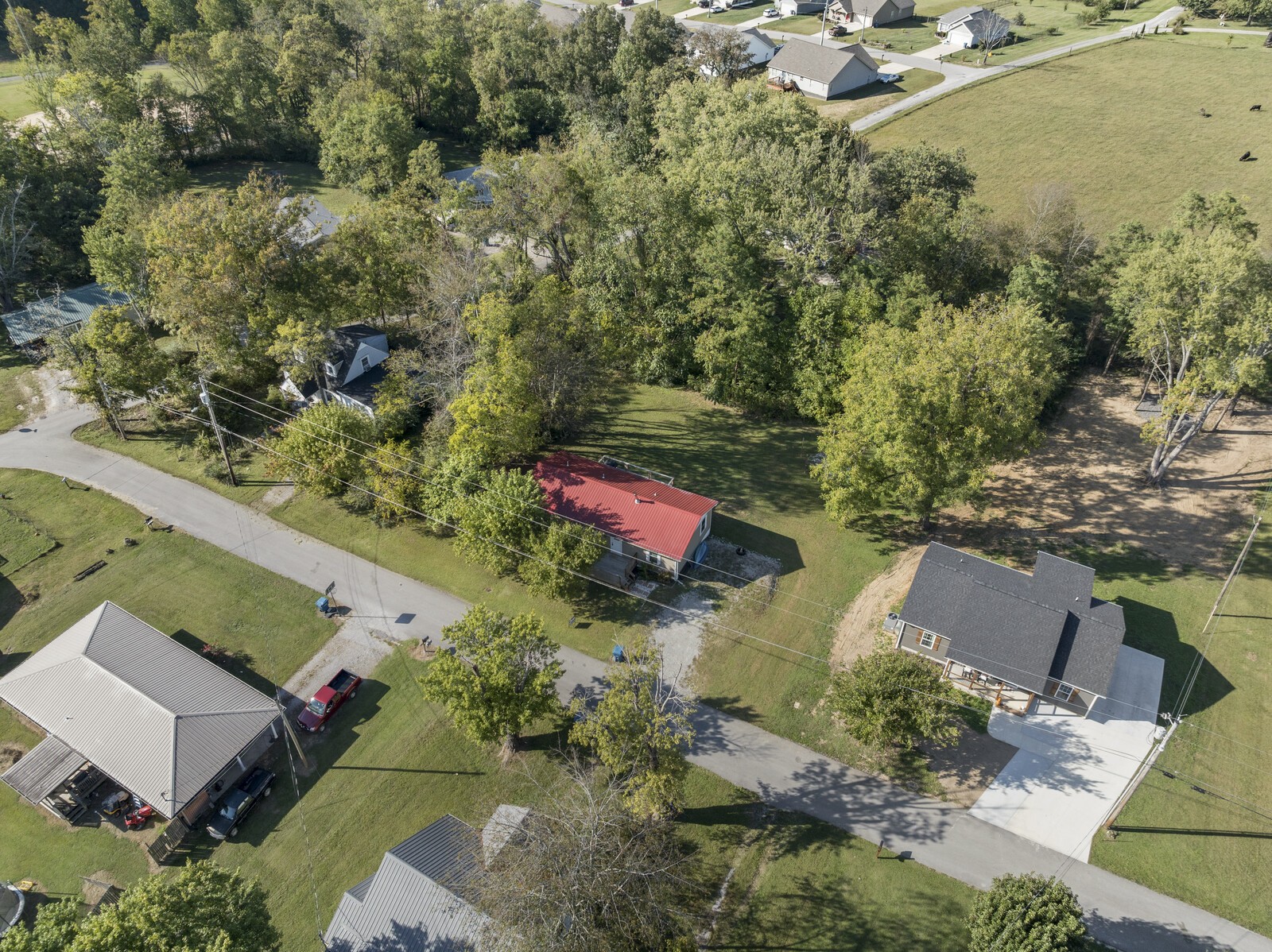 408 Magnolia Street Baxter, TN 38544 - Photo 40 of 44 an aerial view of a house with a yard