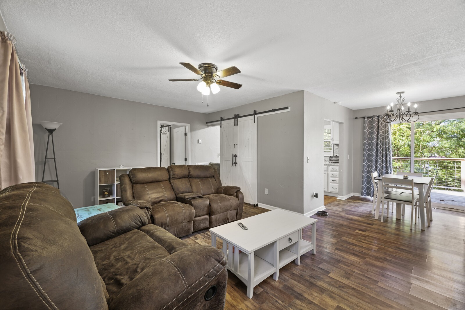 408 Magnolia Street Baxter, TN 38544 - Photo 4 of 44 a living room with furniture a wooden floor and a window