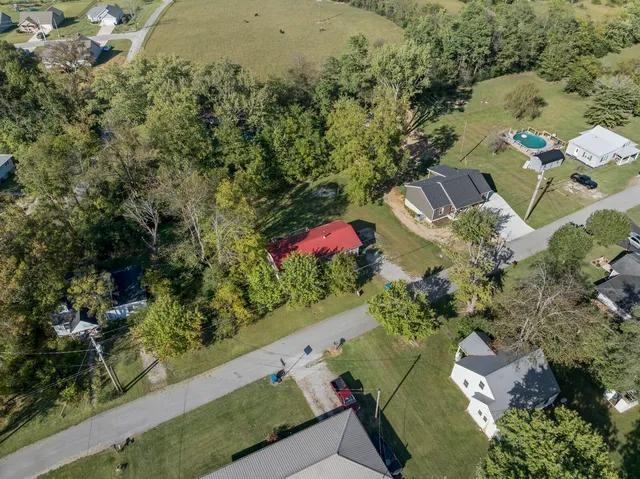 an aerial view of residential house with outdoor space