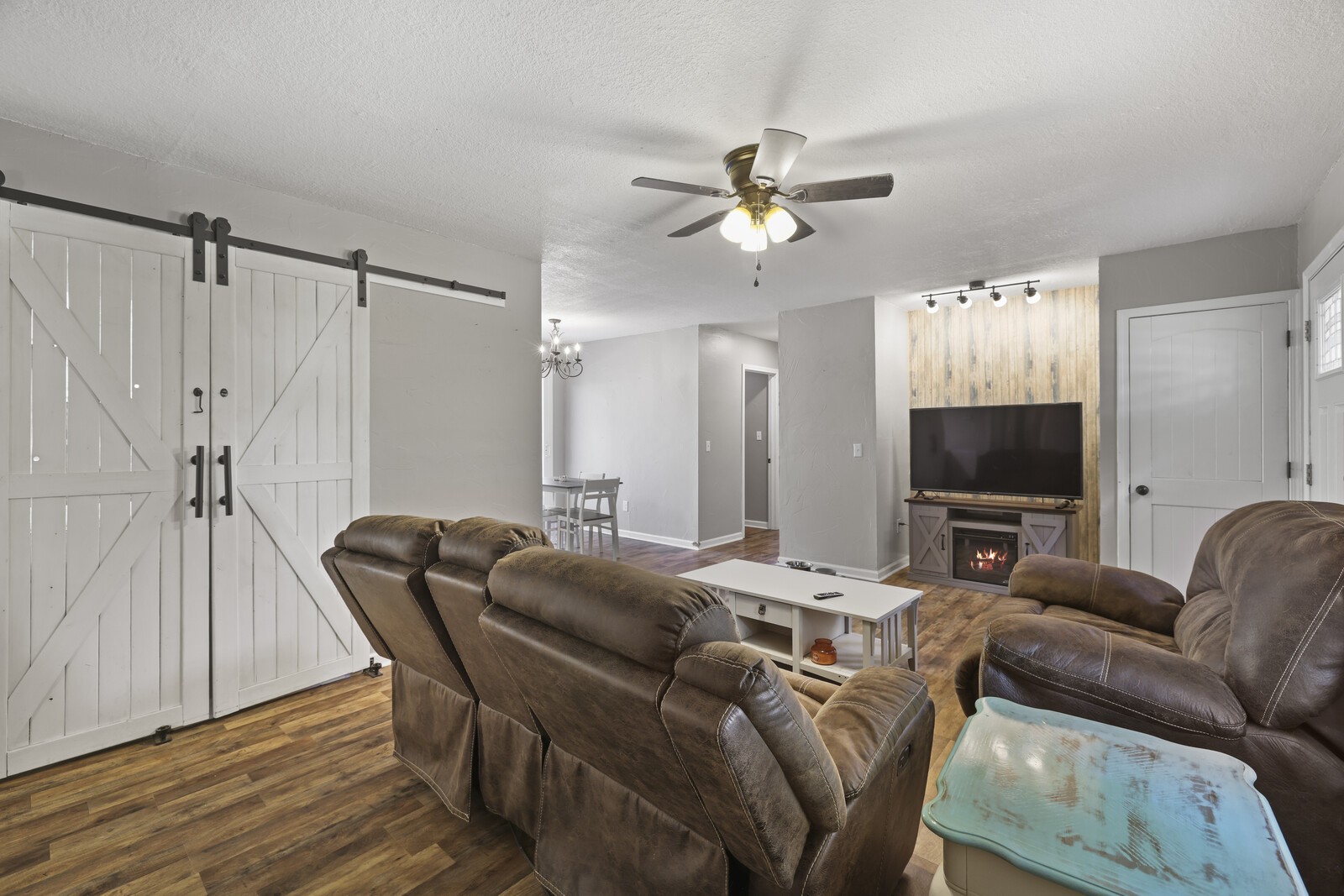 408 Magnolia Street Baxter, TN 38544 - Photo 7 of 44 a living room with furniture and a flat screen tv
