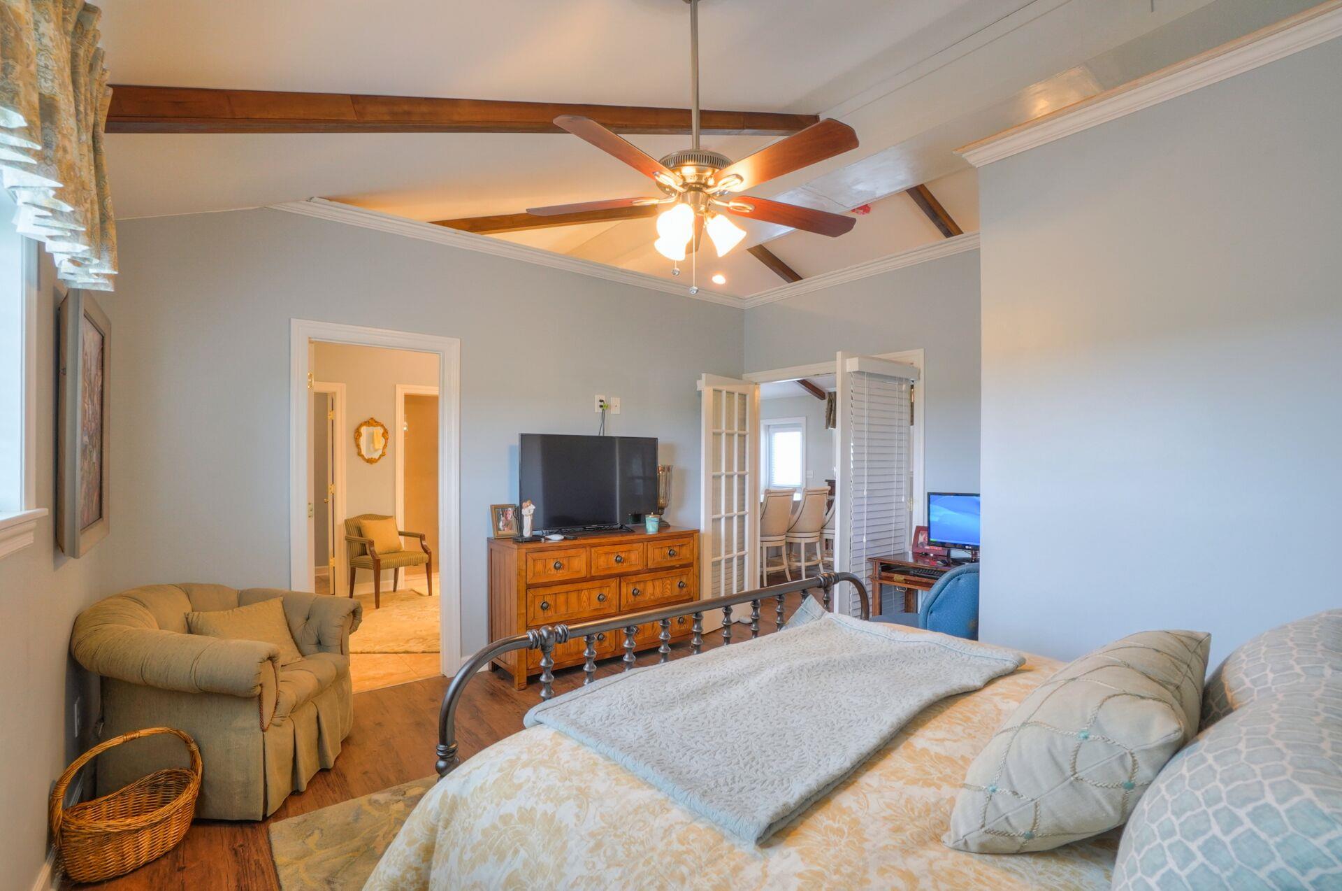 159 County Line Road Bell Buckle, TN 37020 - Photo 11 of 28 a bedroom with furniture and a flat screen tv