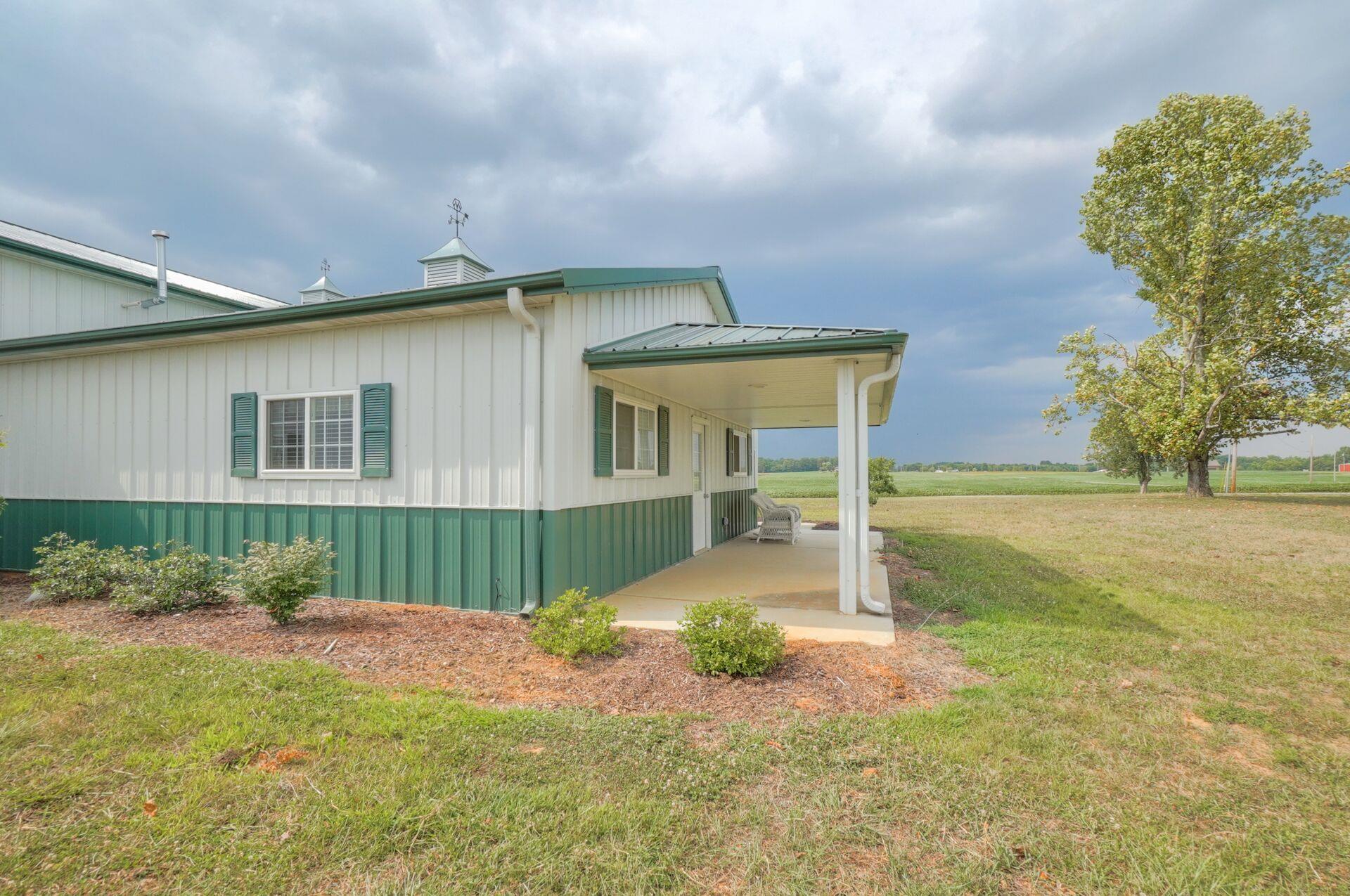 159 County Line Road Bell Buckle, TN 37020 - Photo 12 of 28 a house view with a garden space