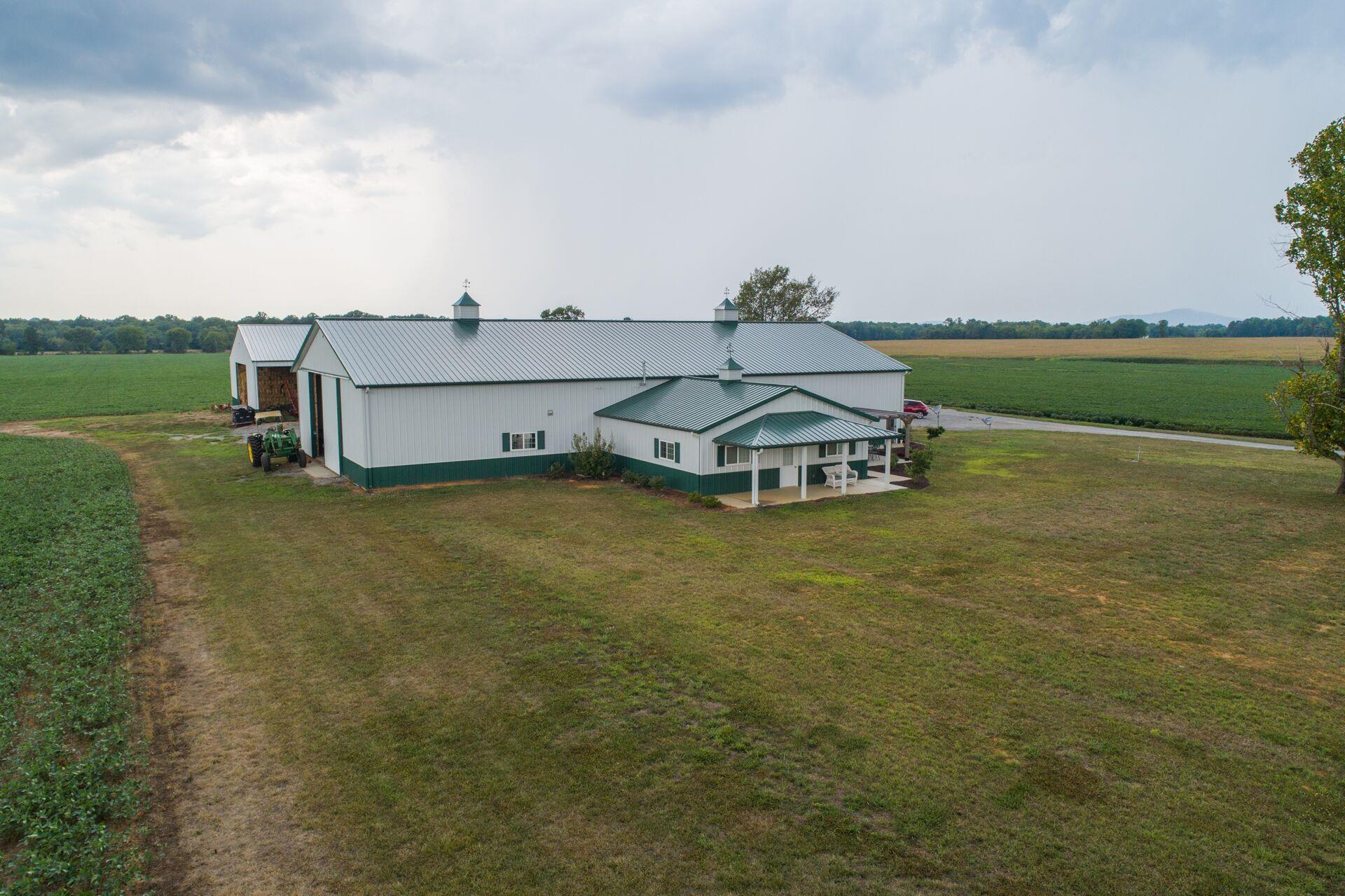 159 County Line Road Bell Buckle, TN 37020 - Photo 2 of 28 a view of a house with a yard
