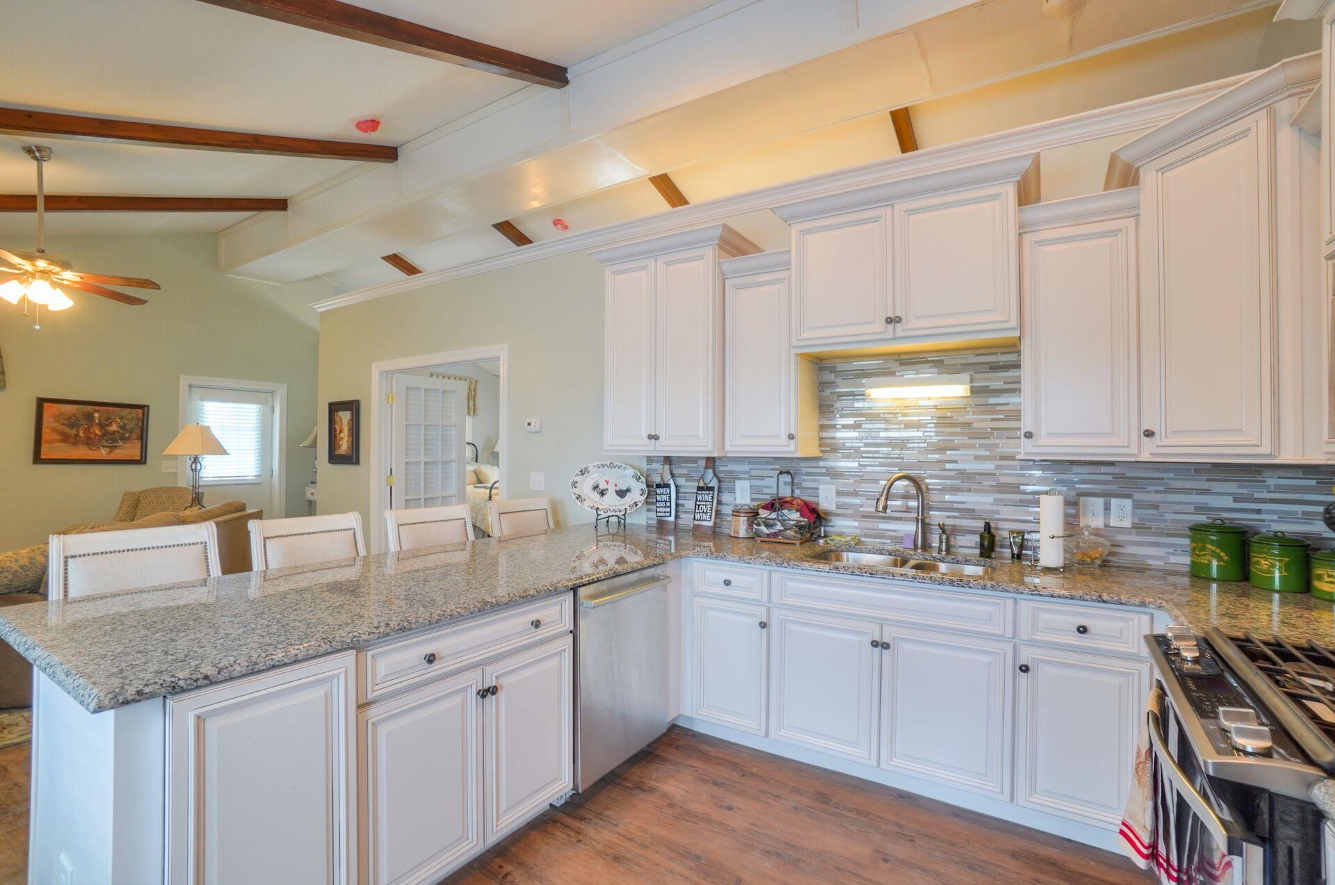 159 County Line Road Bell Buckle, TN 37020 - Photo 6 of 28 a kitchen with sink stove and cabinets
