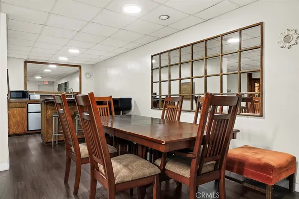 a living room with furniture and a garage