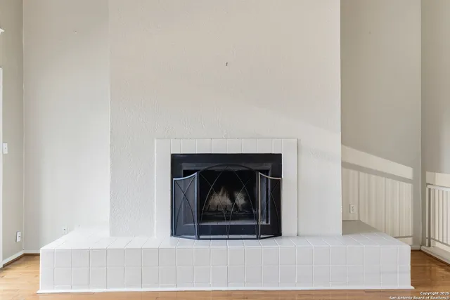 a living room with a fireplace
