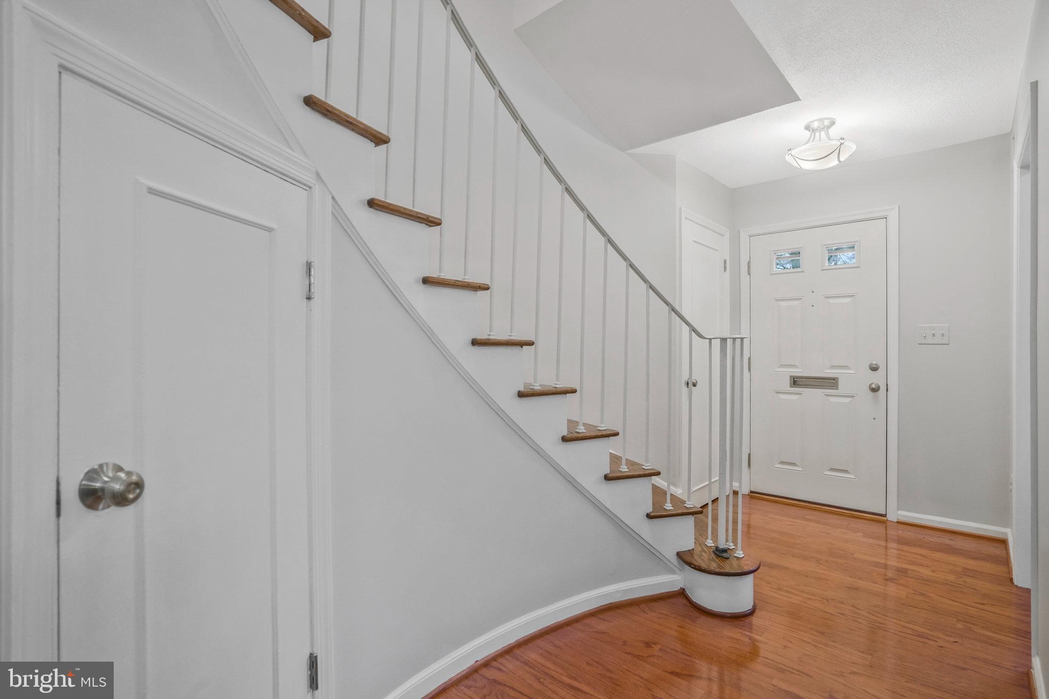 8202 Tory Road, Unit 135 Springfield, VA 22152 - Photo 3 of 63 A Beautiful Entrance with Hardwood Floors