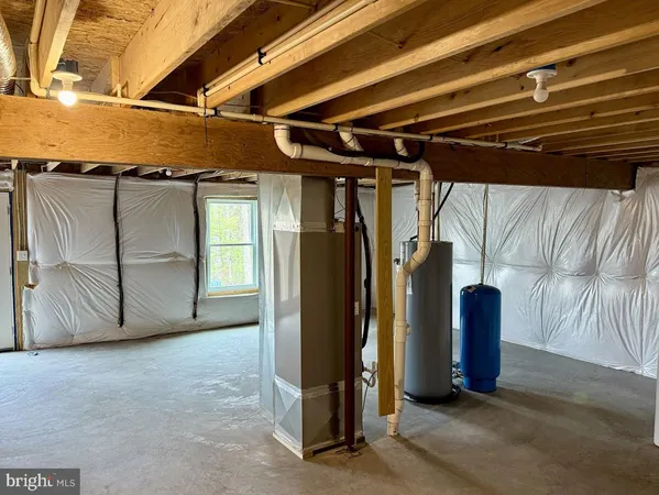 a view of a room with wooden walls