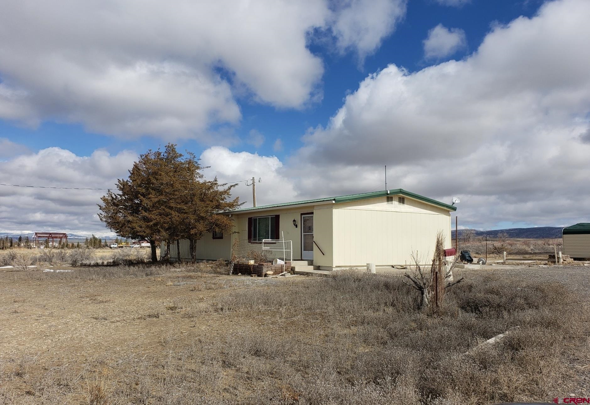 1002 2100th Road Delta, CO 81416 - Photo 1 of 1 a view of a terrace with yard