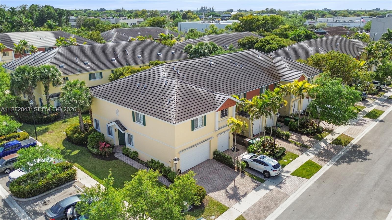 7702 Paddock Place, Unit 7702 Davie, FL 33328 - Photo 2 of 55 an aerial view of a house with a garden