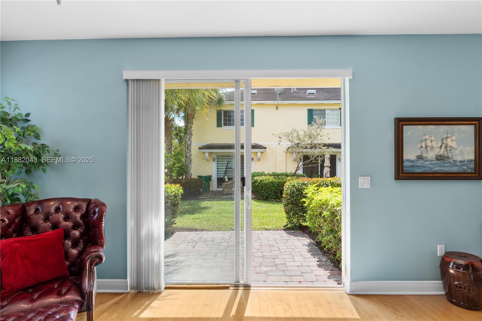 7702 Paddock Place, Unit 7702 Davie, FL 33328 - Photo 24 of 55 a view of livingroom with furniture and floor to ceiling window