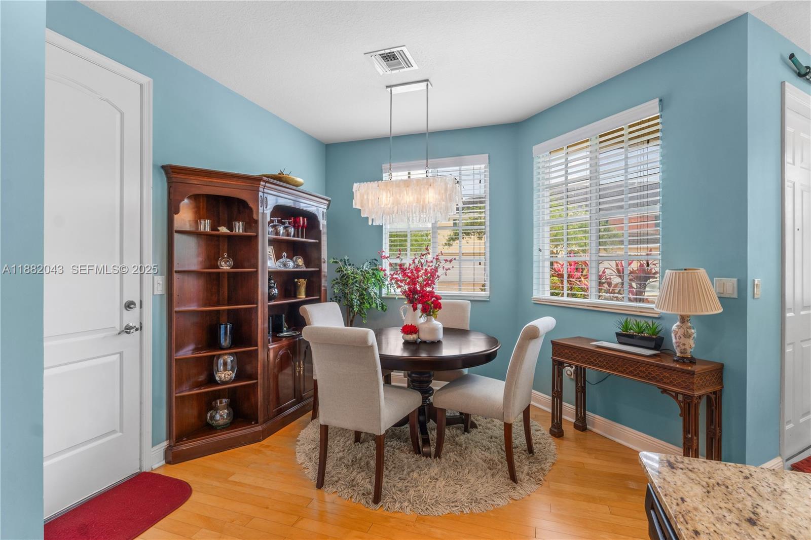 7702 Paddock Place, Unit 7702 Davie, FL 33328 - Photo 29 of 55 a view of a dining room with furniture