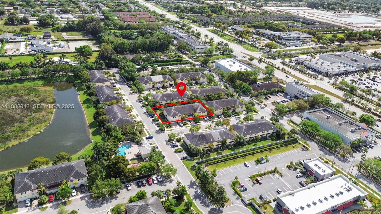 7702 Paddock Place, Unit 7702 Davie, FL 33328 - Photo 45 of 55 an aerial view of residential houses with outdoor space and swimming pool