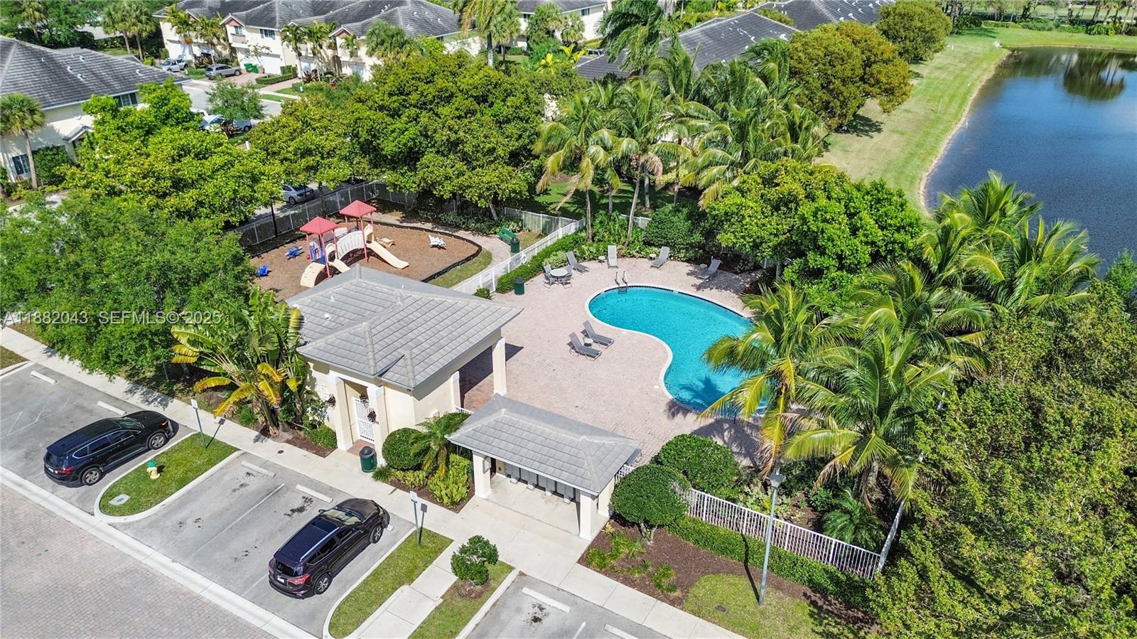7702 Paddock Place, Unit 7702 Davie, FL 33328 - Photo 46 of 55 an aerial view of a house with a yard
