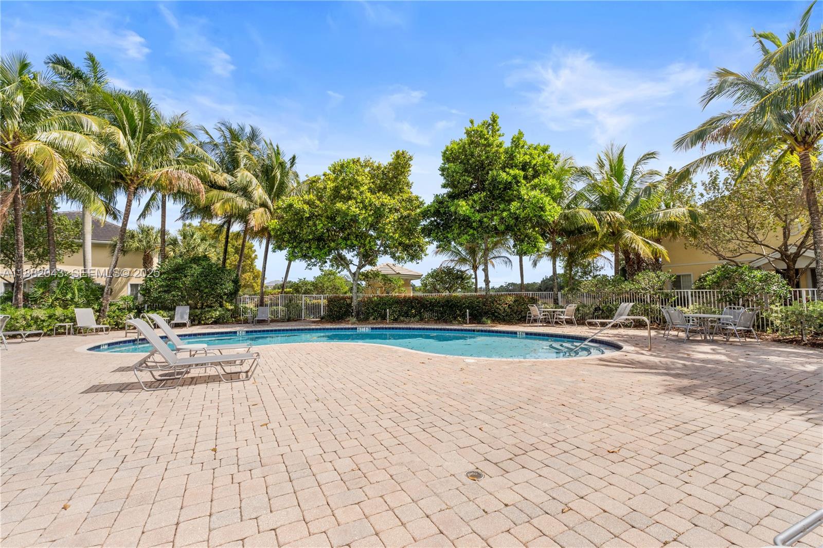 7702 Paddock Place, Unit 7702 Davie, FL 33328 - Photo 51 of 55 a view of outdoor space with trees
