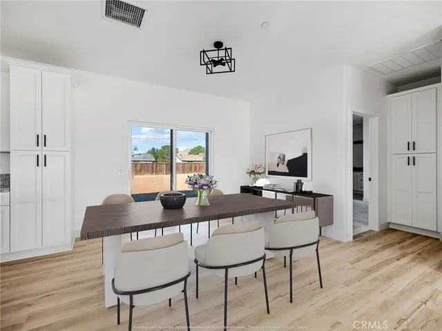 a table and chairs in a room