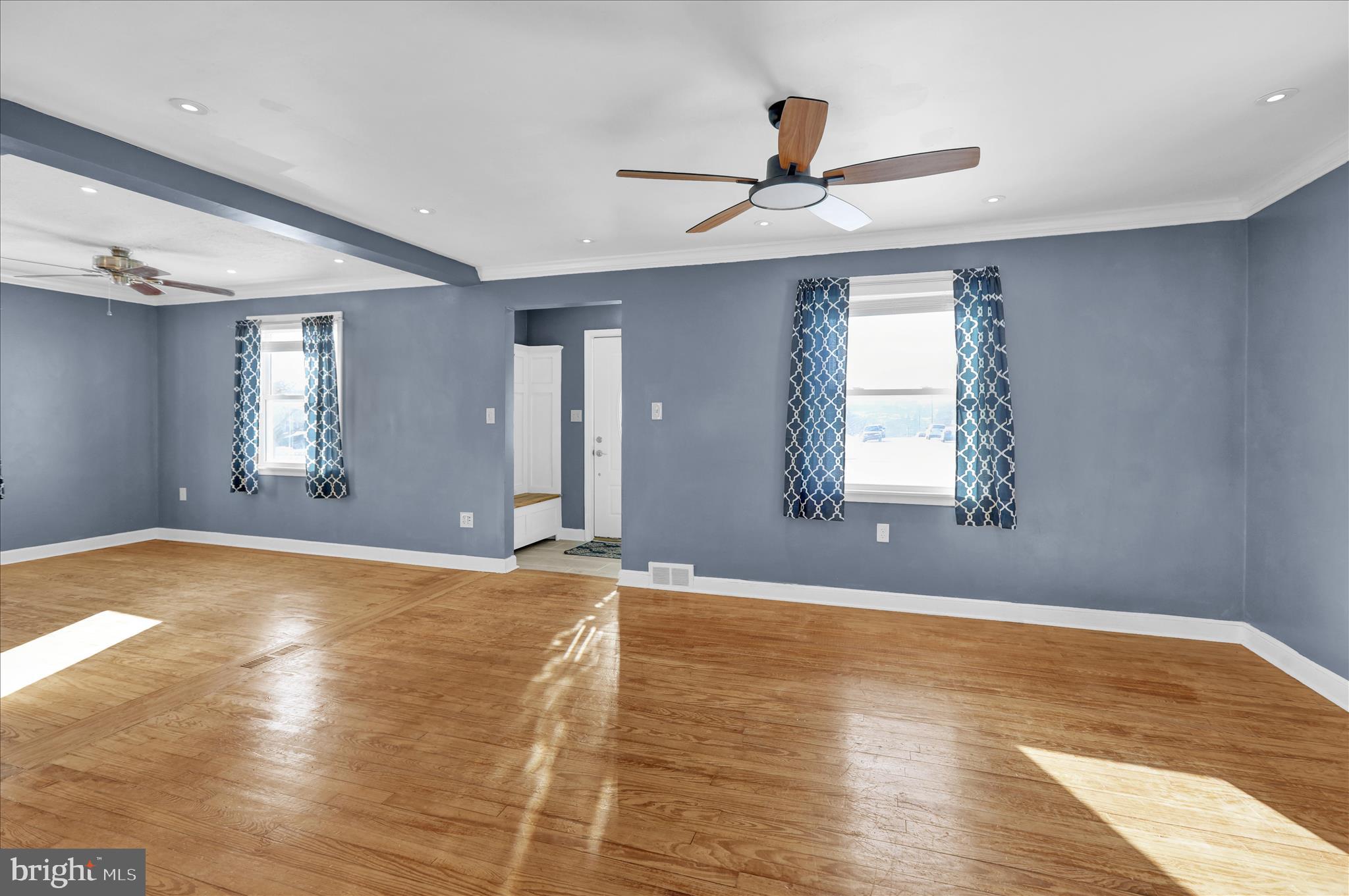 821 Bellefonte Avenue Reading, PA 19607 - Photo 36 of 37 a view of empty room with wooden floor and fan