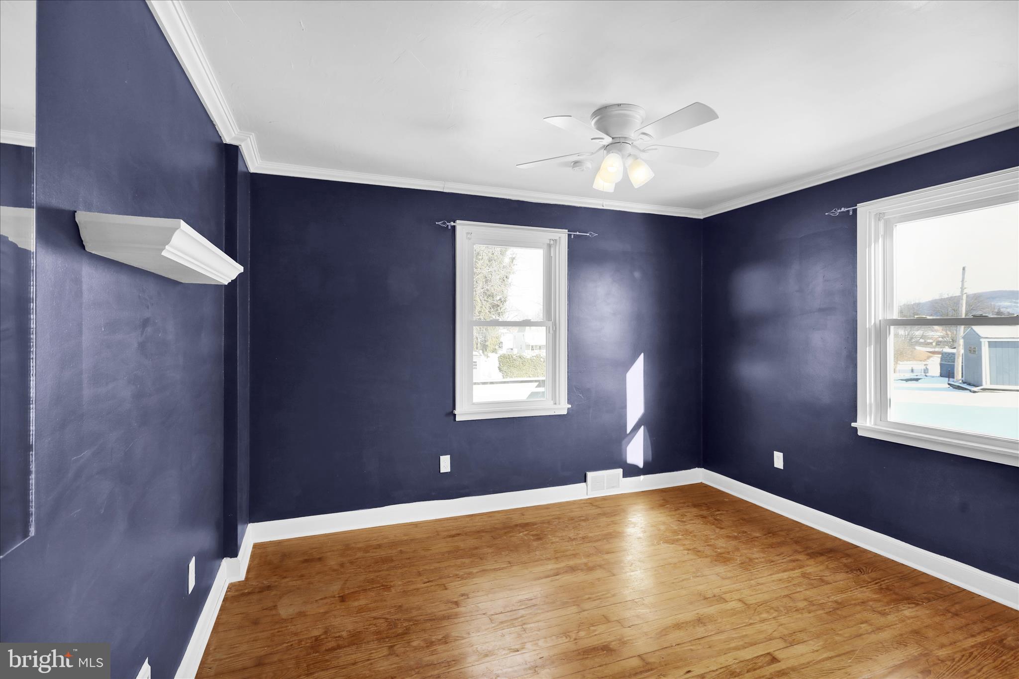 821 Bellefonte Avenue Reading, PA 19607 - Photo 15 of 37 a view of empty room with window and ceiling fan