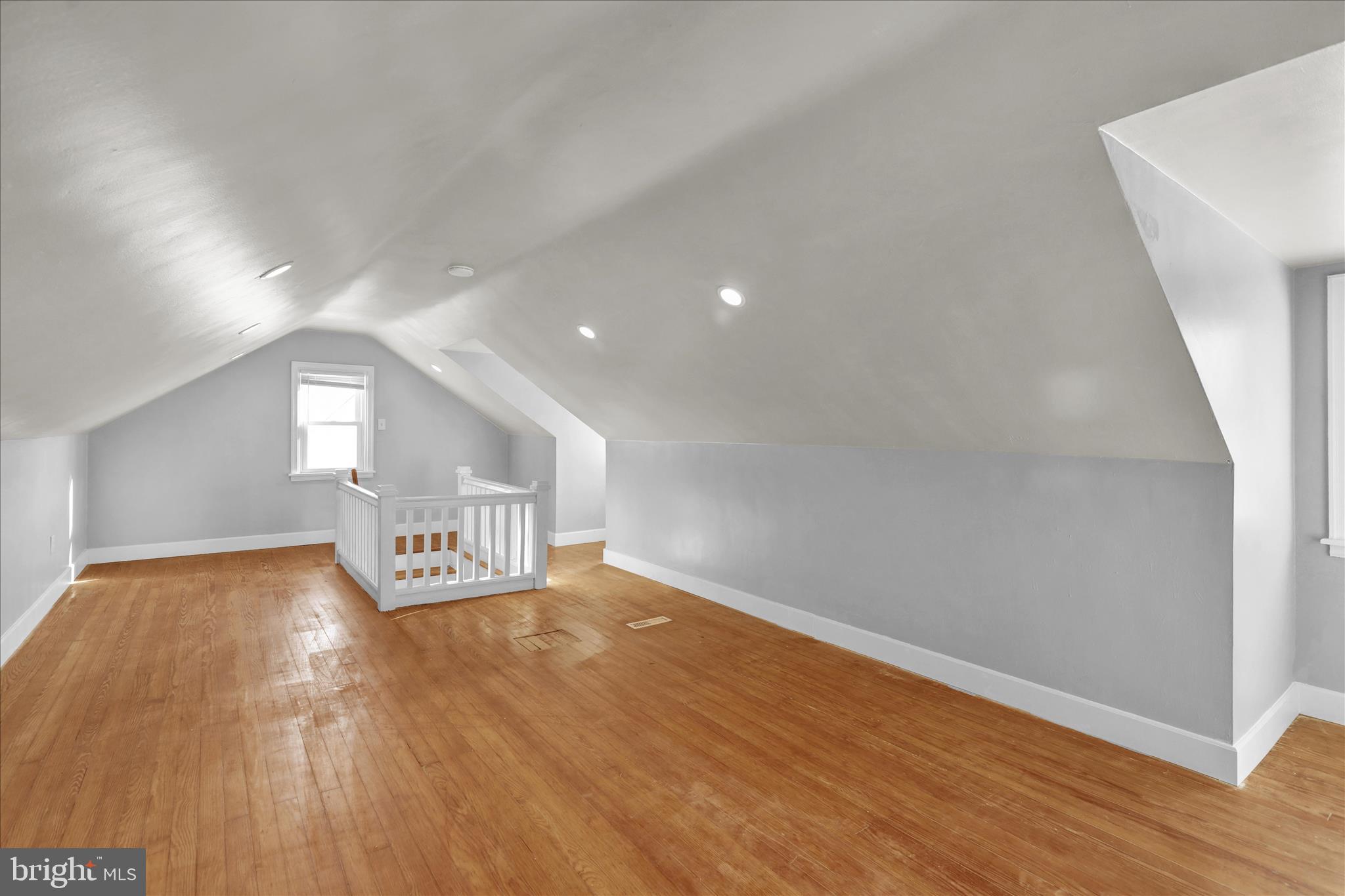 821 Bellefonte Avenue Reading, PA 19607 - Photo 19 of 37 a view of an empty room and wooden floor