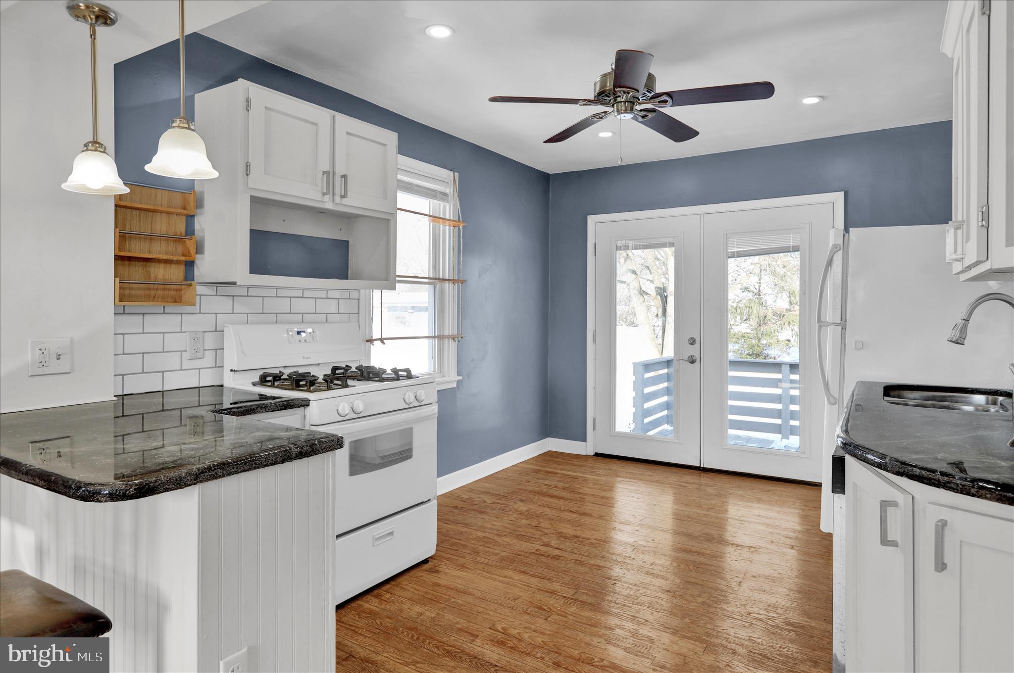 821 Bellefonte Avenue Reading, PA 19607 - Photo 6 of 37 a kitchen with a stove a sink and a refrigerator