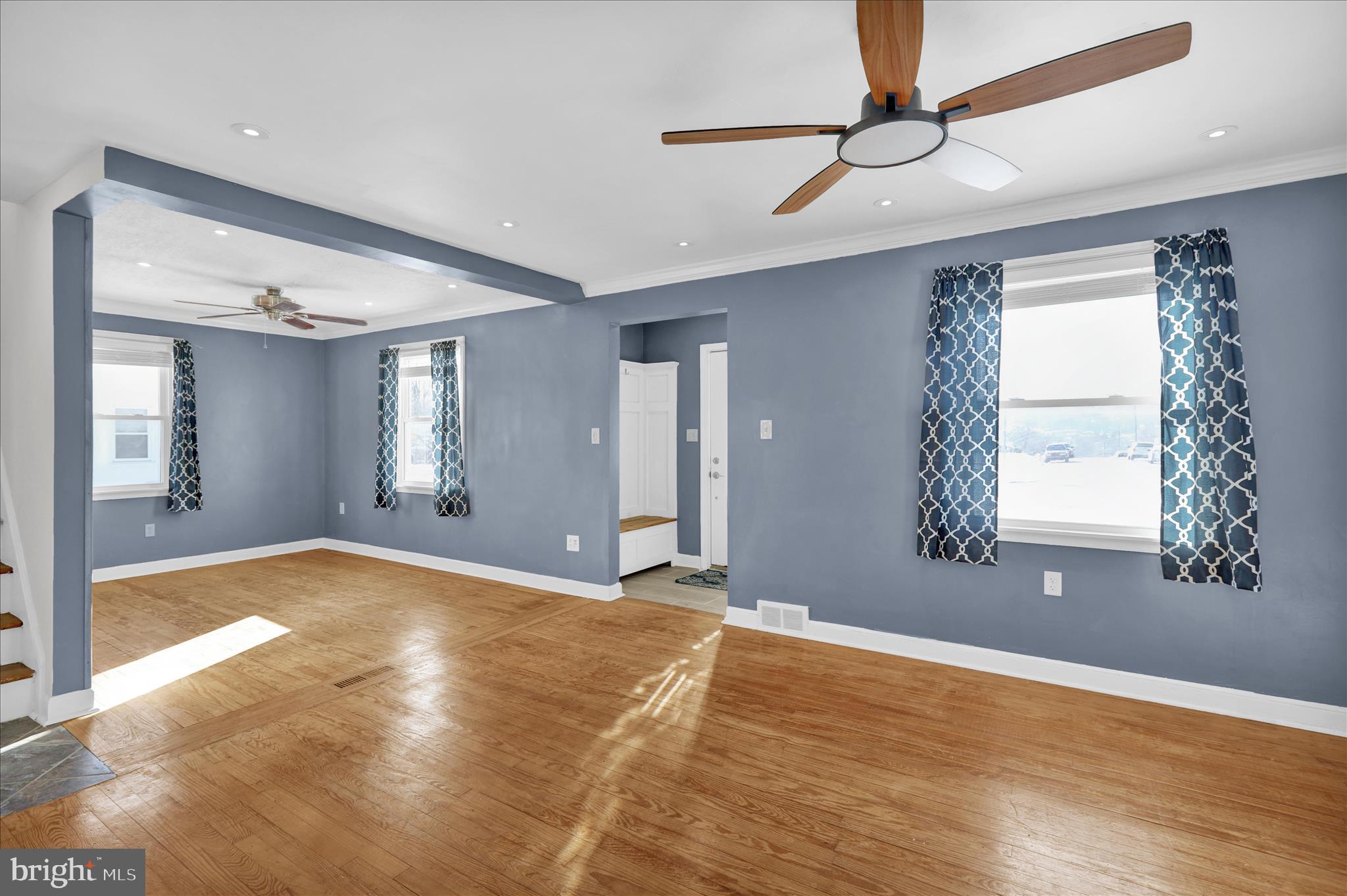 821 Bellefonte Avenue Reading, PA 19607 - Photo 10 of 37 a view of an empty room with window and wooden floor