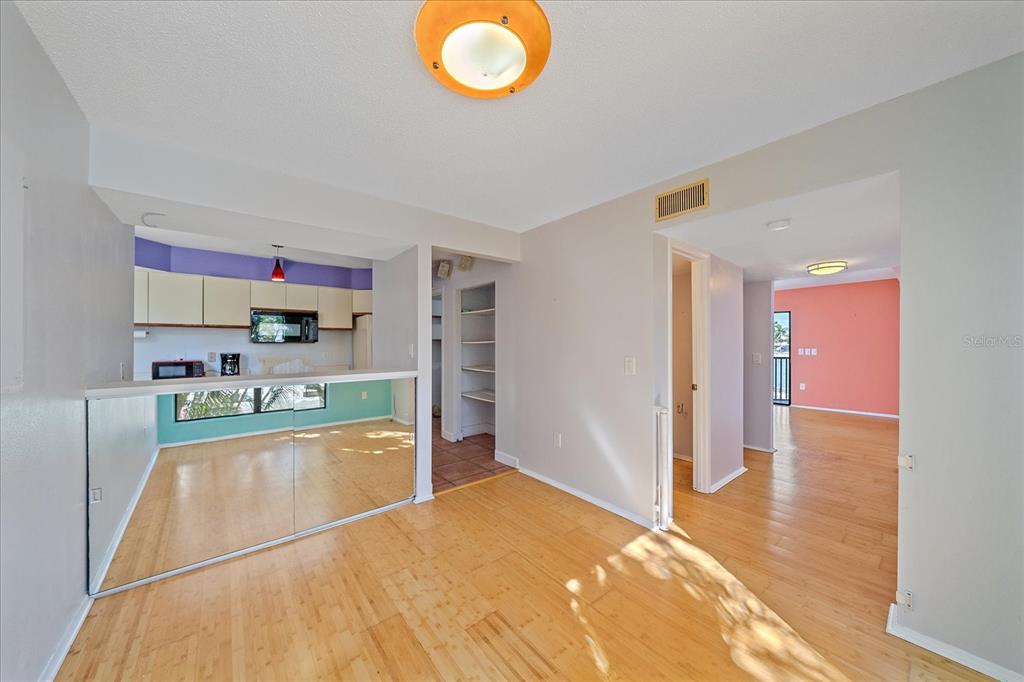 6157 Midnight Pass Road, Unit B12 Sarasota, FL 34242 - Photo 16 of 75 a kitchen with stainless steel appliances granite countertop a sink and cabinets