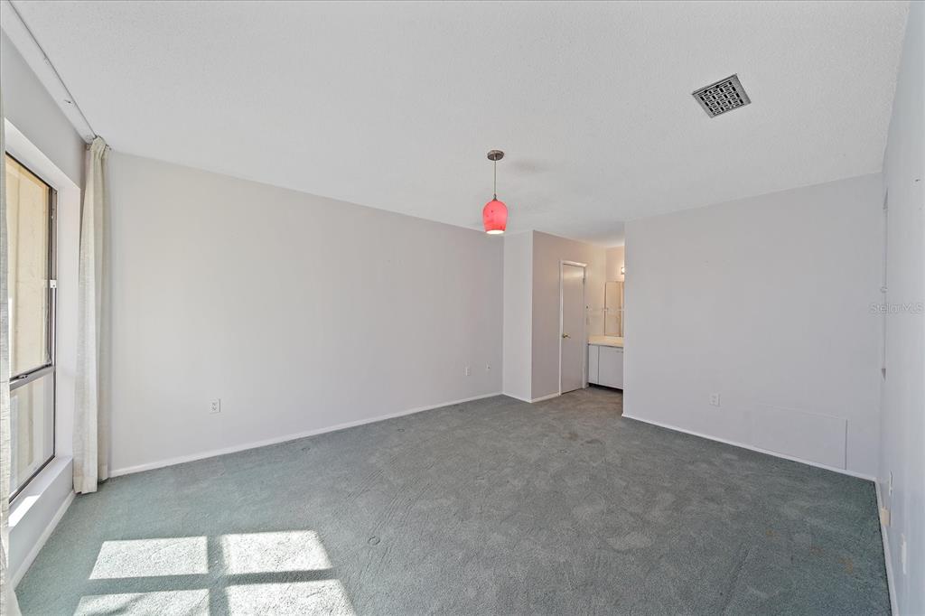 6157 Midnight Pass Road, Unit B12 Sarasota, FL 34242 - Photo 40 of 75 a view of an empty room
