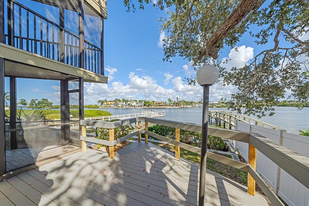 6157 Midnight Pass Road, Unit B12 Sarasota, FL 34242 - Photo 4 of 75 a view of a balcony with staircase