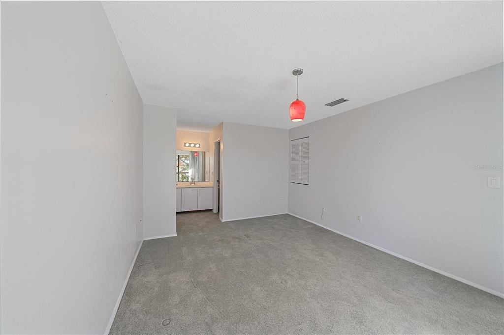 6157 Midnight Pass Road, Unit B12 Sarasota, FL 34242 - Photo 41 of 75 a view of an empty room