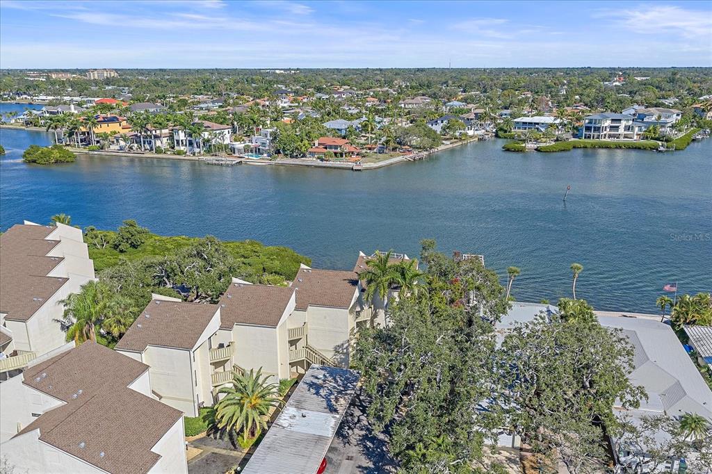 6157 Midnight Pass Road, Unit B12 Sarasota, FL 34242 - Photo 61 of 75 an aerial view of a house with a lake view