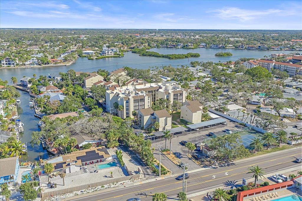 6157 Midnight Pass Road, Unit B12 Sarasota, FL 34242 - Photo 63 of 75 aerial view of city and lake