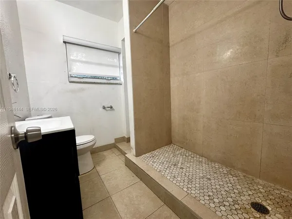 a bathroom with a sink and a toilet
