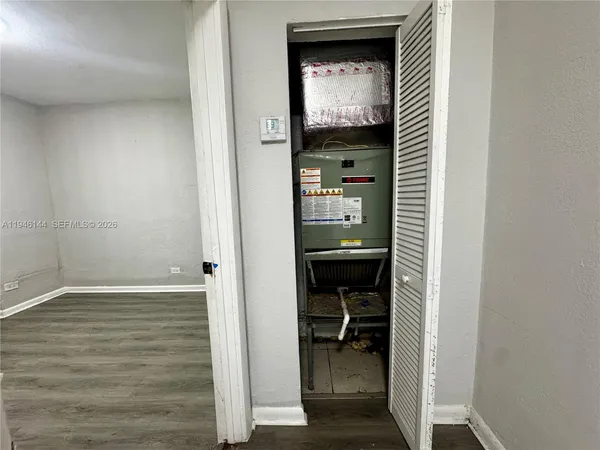 a view of a livingroom from a hallway