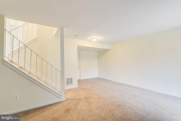 a view of an entryway with stairs