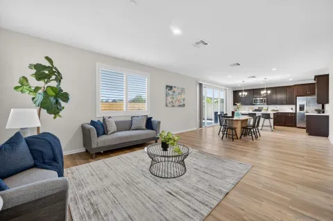 a living room with furniture and a table