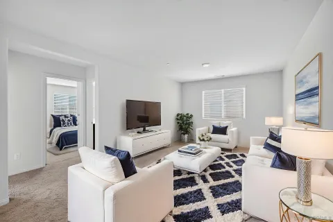 a bathroom with a sink double vanity granite tub and a mirror